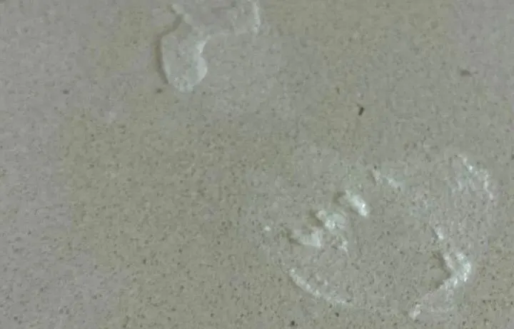 Dried compound/residue on quartz