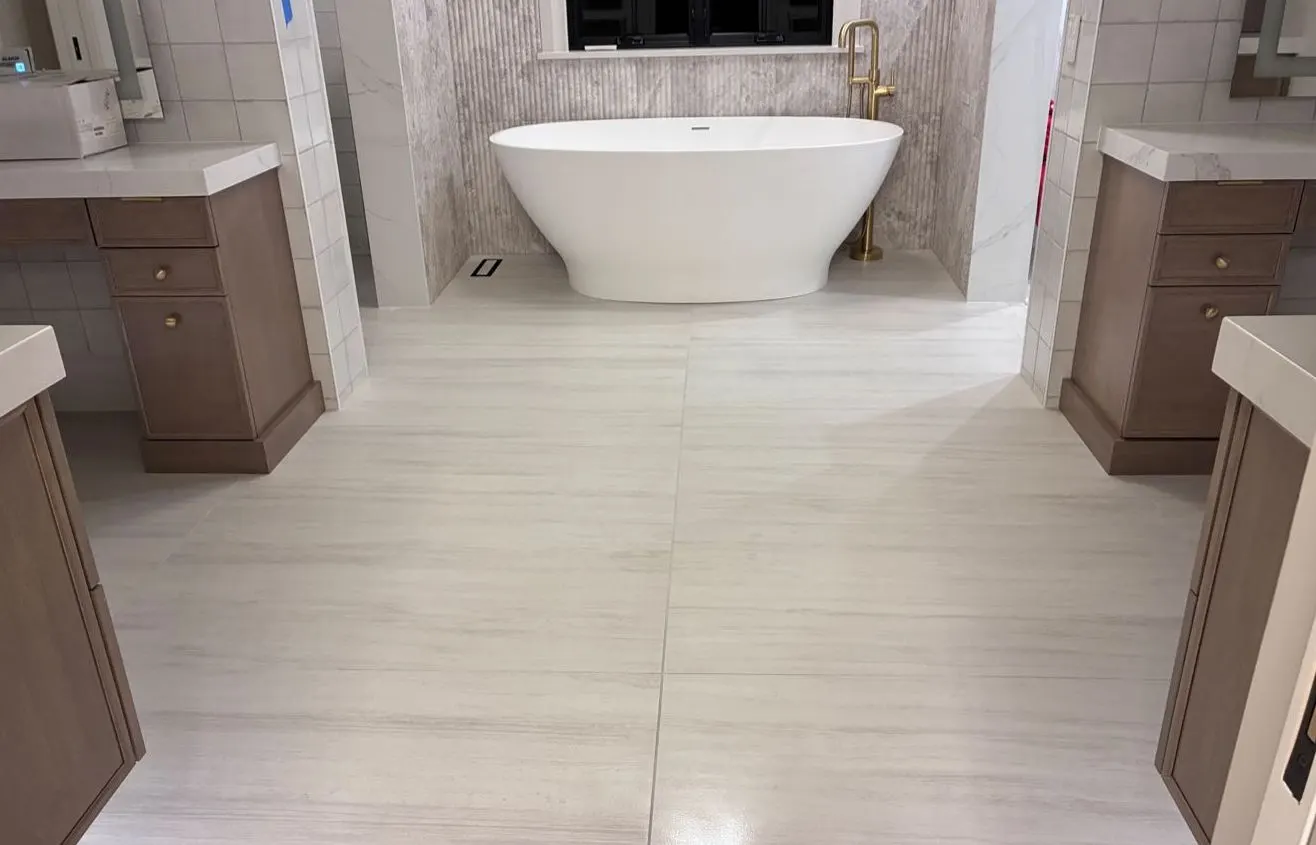 Finished bath, freestanding tub, clean tile floor